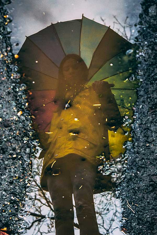women-reflection Women Reflection in Puddle