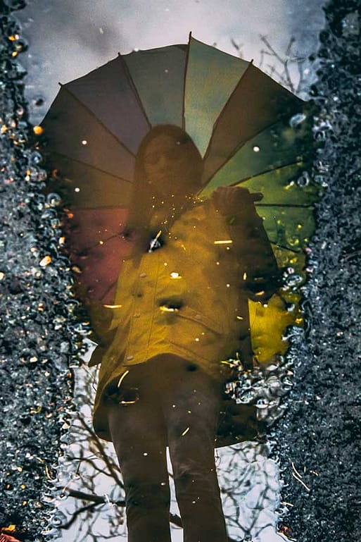 Women Reflection in Puddle